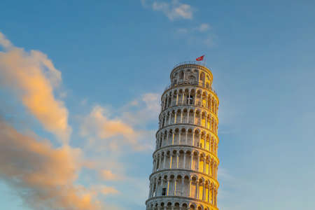 The Leaning Tower in Pisa, Italy at sunsetの写真素材