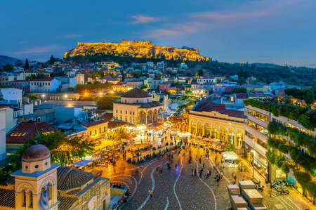 Downtown Athens city skyline, cityscape with The Acropolis and the Parthenon Temple  in Greece at sunset from Monastiraki Squareの写真素材