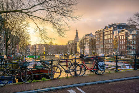 Amsterdam downtown city skyline cityscape of Netherlands at sunsetの写真素材