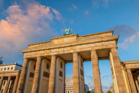The Brandenburg Gate in downtown Berlin Germany at sunsetの写真素材