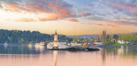 Oslo waterfront downtown city skyline cityscape in Norway at sunsetの写真素材