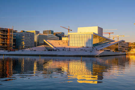 Oslo waterfront downtown city skyline cityscape in Norway at sunsetの写真素材