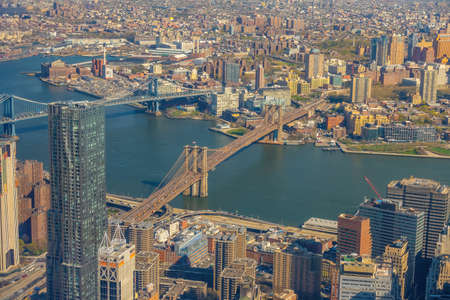 Manhattan city skyline cityscape of New York from top view in USA with Manhattan bridge and Brooklynの写真素材