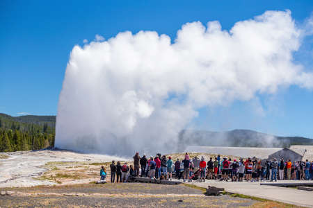 Famous Old Faithful Geyser in Yellowstone National Park in USAの写真素材