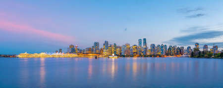 Downtown Vancouver skyline, cityscape of British Columbia in Canada at sunsetの写真素材