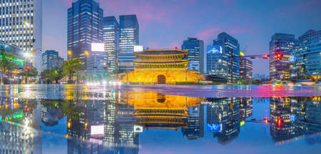 Downtown Seoul city skyline at Dongdaemun Gate, cityscape of South Korea at sunsetの写真素材