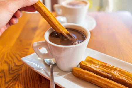 Hot chocolate with Churros, traditional dessert in Barcelona, Spainの写真素材