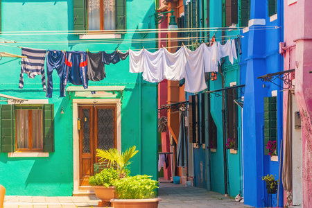 View of the colorful Venetian houses at the Islands of Burano in Veniceの写真素材