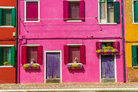 View of the colorful Venetian houses at the Islands of Burano in Veniceの写真素材