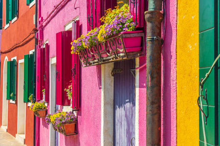 View of the colorful Venetian houses at the Islands of Burano in Veniceの写真素材