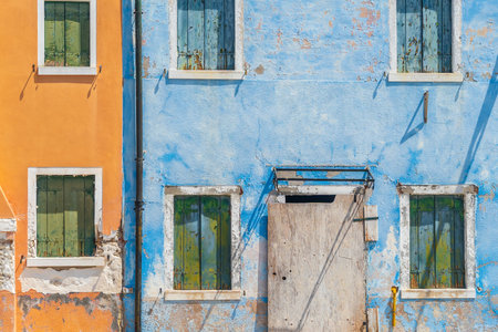 View of the colorful Venetian houses at the Islands of Burano in Veniceの写真素材