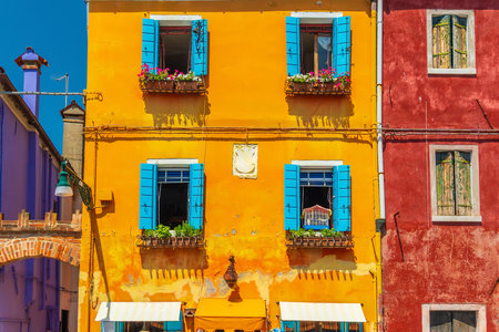 View of the colorful Venetian houses at the Islands of Burano in Veniceの写真素材