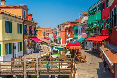 Burano, Italy - May 23, 2023 : View of the colorful Venetian houses at the Islands of Burano in Veniceの写真素材