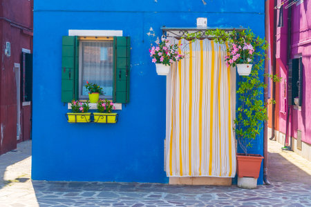 View of the colorful Venetian houses at the Islands of Burano in Veniceの写真素材