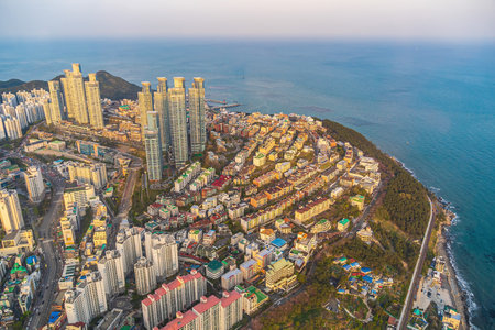 Busan city skyline at Haeundae district, cityscape of South Korea at sunset