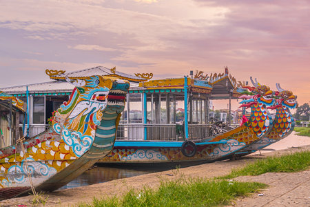 Traditional Dragon boat in Hue Vietnam at twilightの写真素材