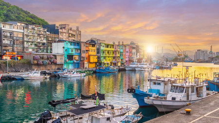 Cityscape of Colorful Zhengbin Fishing Port  in Keelung near Taipei city, Taiwan at sunsetの写真素材