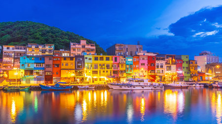 Cityscape of Colorful Zhengbin Fishing Port  in Keelung near Taipei city, Taiwan at sunsetの写真素材