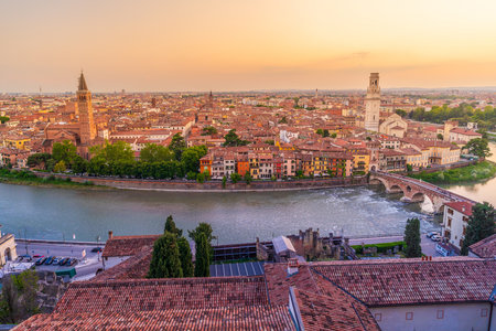 Verona city downtown skyline, cityscape of Italy at sunset
