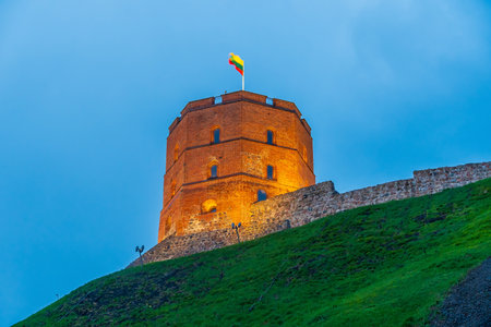 Gediminas Castle Tower in downtown Vilnius city, cityscape of  Lithuania in Europe at twilight