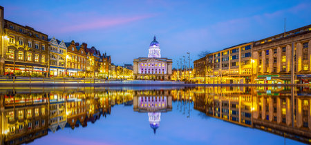 Downtown Nottingham city skyline at Old Market Square, cityscape of England at twilightの写真素材