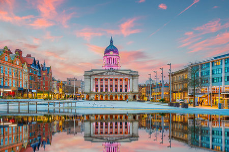 Downtown Nottingham city skyline at Old Market Square, cityscape of England at twilightの写真素材