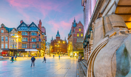 Downtown Nottingham city skyline at Old Market Square, cityscape of England at twilightの写真素材