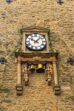 Clock tower in old town of Oxford city, cityscape of England at sunsetの写真素材