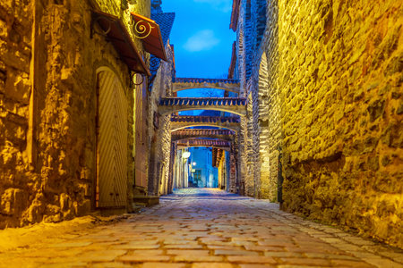 St. Catherine's Passage in Old town Tallinn , cityscape of Estonia at sunsetの写真素材