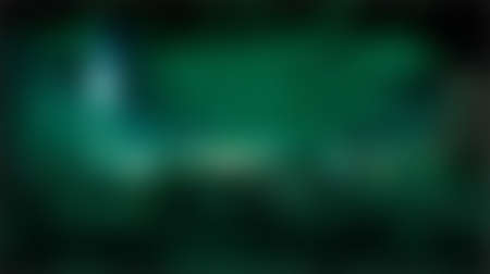 Green blurred background, green bokeh abstract light backgroundの写真素材