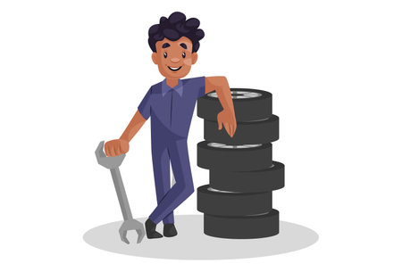 Vector graphic illustration. Indian mechanic is standing with wheels and wrench. Individually on a white background.のイラスト素材