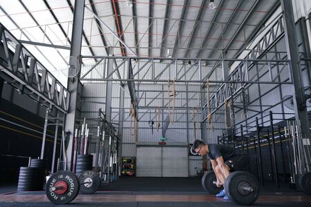 Selangor, Malaysia - 8 may 2015 : Cross fit lifting bar. Cross fit training. Sports, Cross fit and fitness concept.のeditorial素材