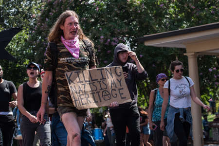 Charlottesville, Virginia USA August 12, 2017 Transgender veteran activist protesting Unite the Right rally, solidarity in support of Robert E Lee confederate statue and to show strength in numbersのeditorial素材