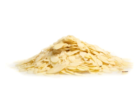 A pile of slice almonds isolated on a white backgroundの写真素材