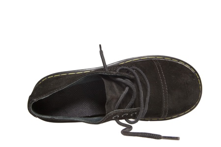 Shoe lying on side. Studio isolated on white background. の写真素材