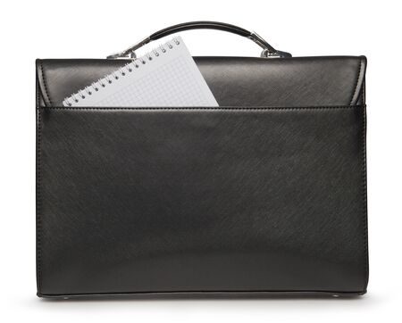 Black business briefcase with blank notepad as place for text on white background の写真素材