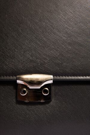 Close-up metal lock of black business caseの写真素材