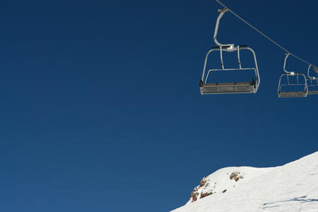 A cableway on a ski resort on a snowy mountain.の写真素材