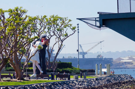 The scupture of unconditional surrender in San Diego, California, United States of America, based on the photograph by Alfred Eisenstaedt, of a sailor kissing a nurse after the end of war world II  のeditorial素材