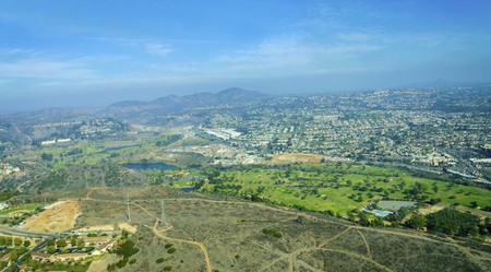 Aerial view of Mission Valley neighborhood, San Diego in Southern California, United States of America. A wide river valley trending east-west in San Diego, through which the river flows to the Pacific Ocean.の写真素材