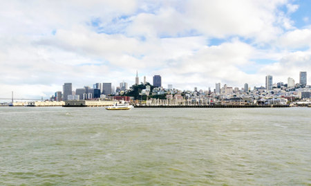The San Francisco skyline in California, United states of America from Alcatraz island. A view of the cityscape, the skyscrapers, architecture, fisherman's wharf and piers and Transamerica pyramid.のeditorial素材