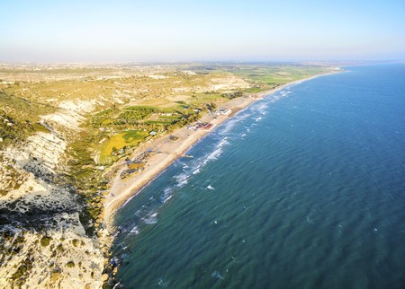 Aerial view of the arcaeological site of the ancient city of Kourio which is located in the district of Limassol, Cyprus. A view of the ancient theatre and the beach from the hill.の写真素材