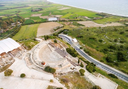 Aerial view of the arcaeological site of the ancient city of Kourio which is located in the district of Limassol, Cyprus. A view from the top of the greek roman theatre forming a semicircle, the beach and fields.の写真素材