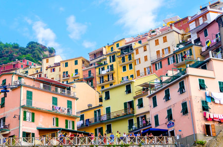 Manarola town, Riomaggiore, La Spezia province, Liguria, northern Italy. View of the colourful houses on surrounding hills, balconies and windows. Part of the Cinque Terre National Park and a UNESCO World Heritage Site.のeditorial素材