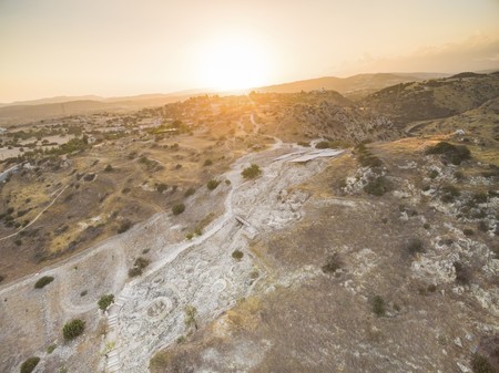 Aerial bird's eye view of UNESCO world heritage site Choirokoitia, Larnaca, Cyprus. View of Khirokoitia, a prehistoric ancient neolithic archaelogical settlement with round houses, from above.の写真素材