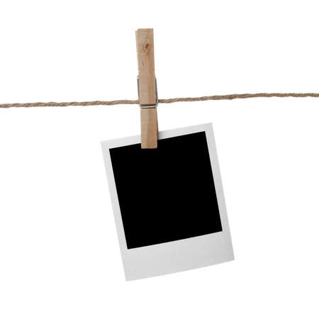 instant photo on a cloth pinの写真素材