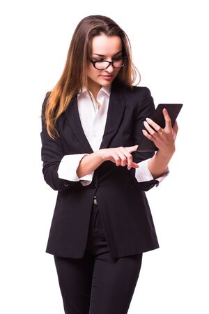 Young and attractive business woman in glasses isolated on white. Thinking and successful look.の写真素材