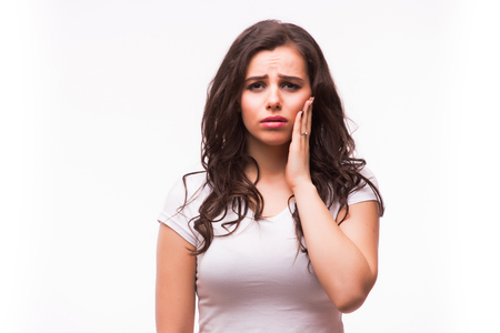 woman suffering from jaw pain, toothache, tooth sensitivityの写真素材
