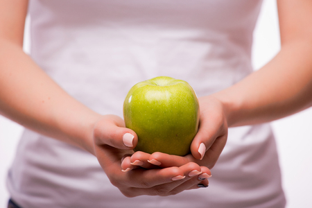 Woman hands with appleの写真素材