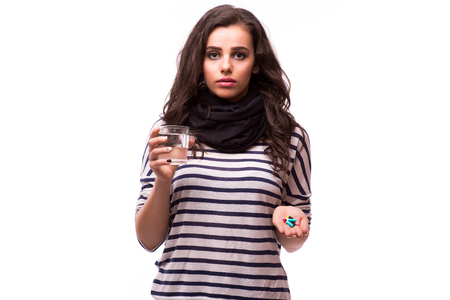 women are taking medicines and vitamins for help Sick and healthyの写真素材